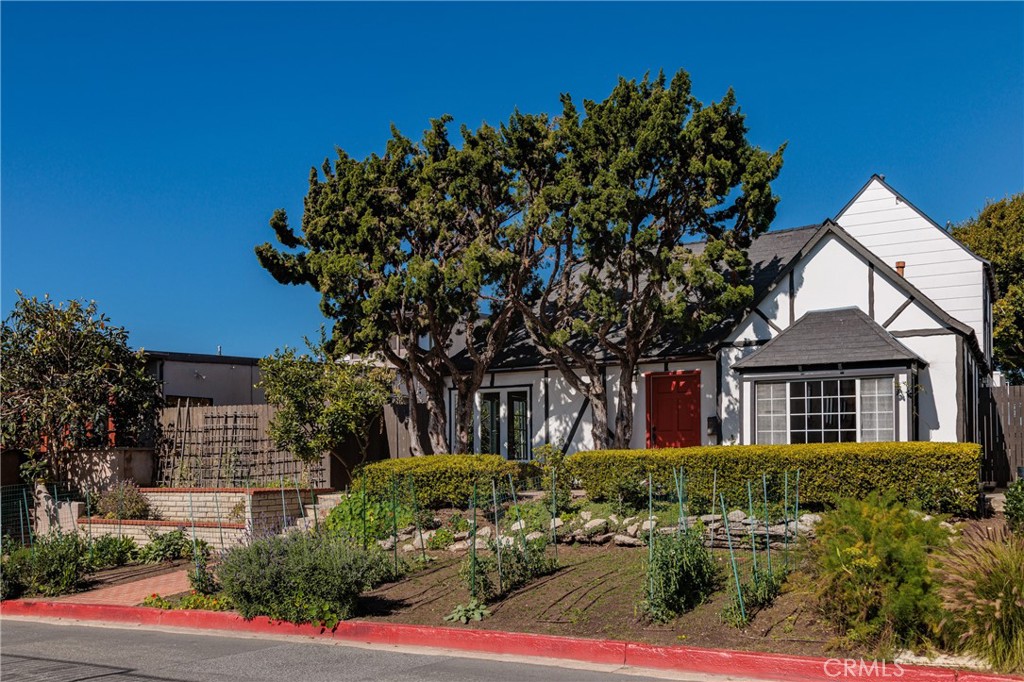 351 Hazel Drive Corona del Mar, CA 92625 - Photo 41 of 58 front view of a house with a tree