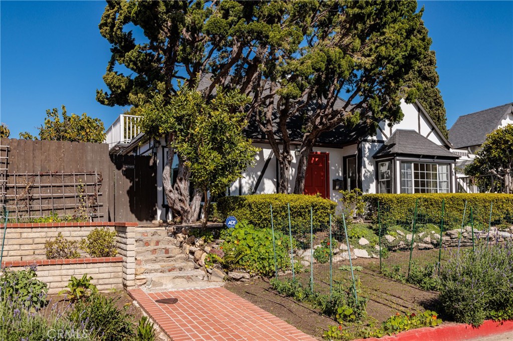 351 Hazel Drive Corona del Mar, CA 92625 - Photo 42 of 58 front view of a house with a tree