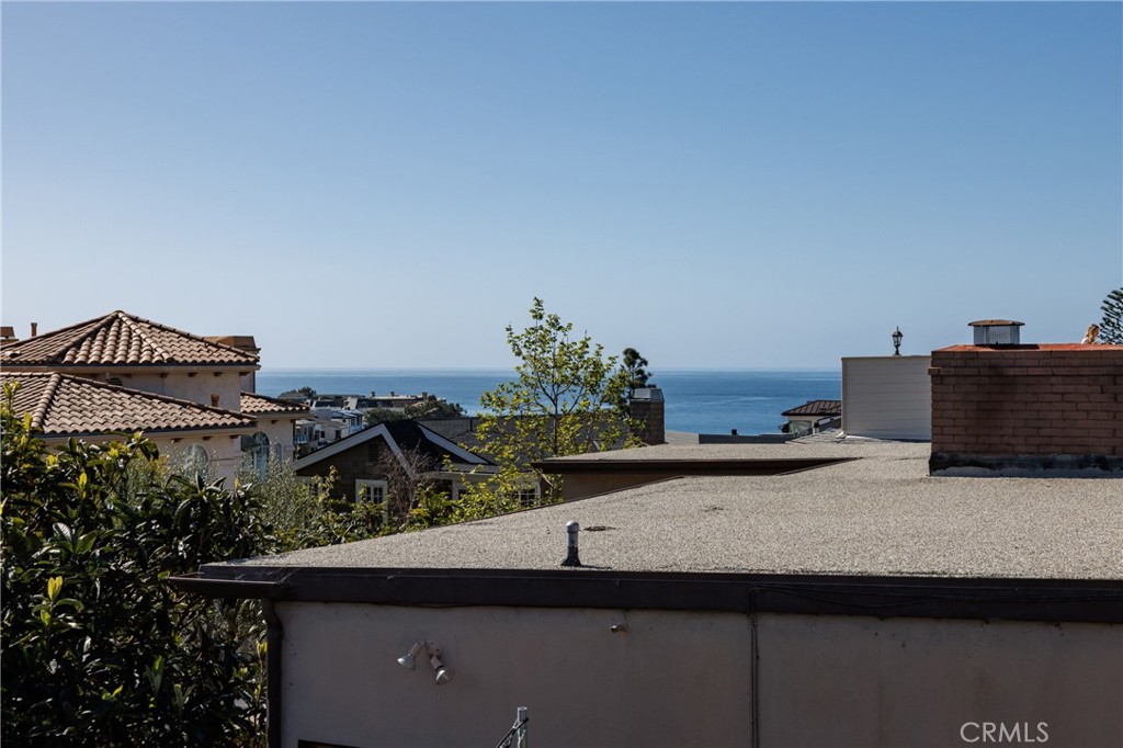 351 Hazel Drive Corona del Mar, CA 92625 - Photo 57 of 58 a kitchen with a sink and cabinets