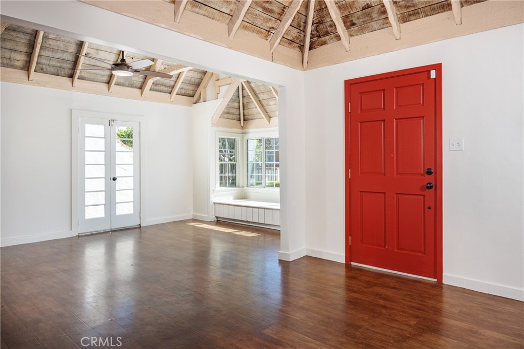 351 Hazel Drive Corona del Mar, CA 92625 - Photo 6 of 58 an empty room with wooden floor closet and windows