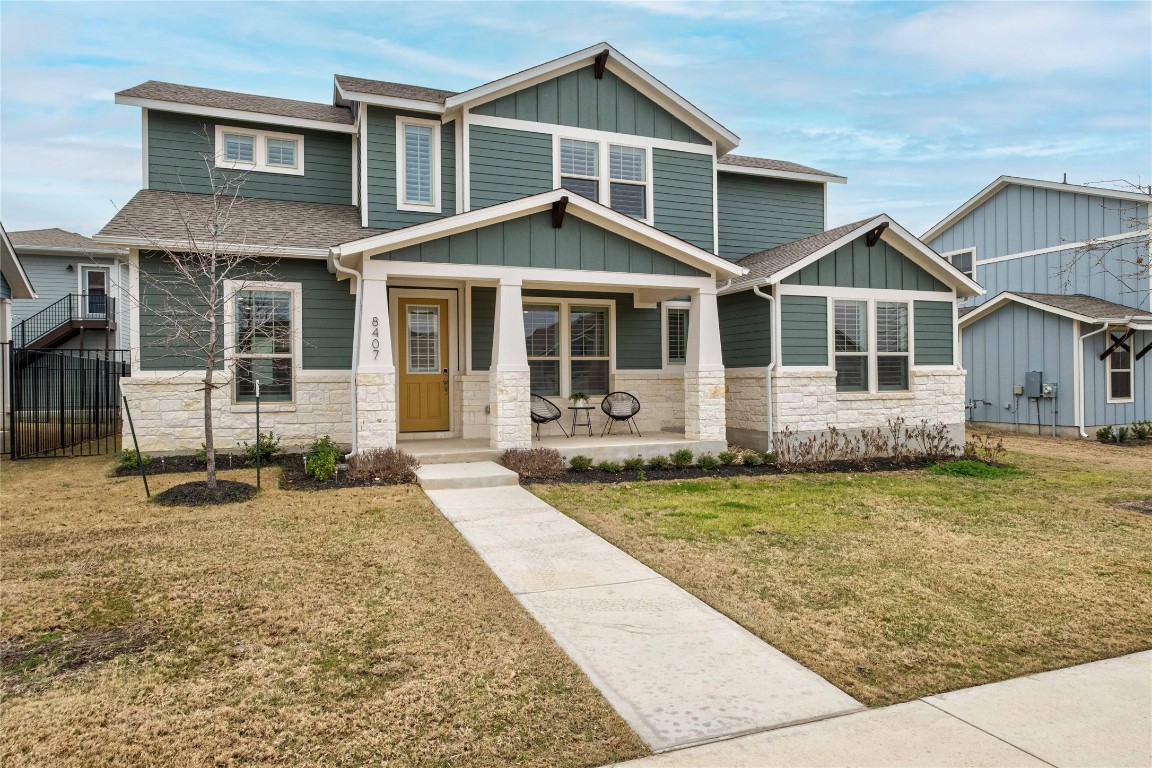 front view of a house with a yard