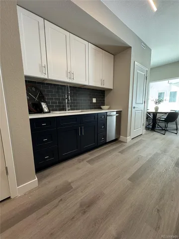 a kitchen with stainless steel appliances granite countertop a stove and a granite counter tops