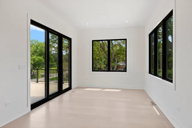 a kitchen with a sink and a large window
