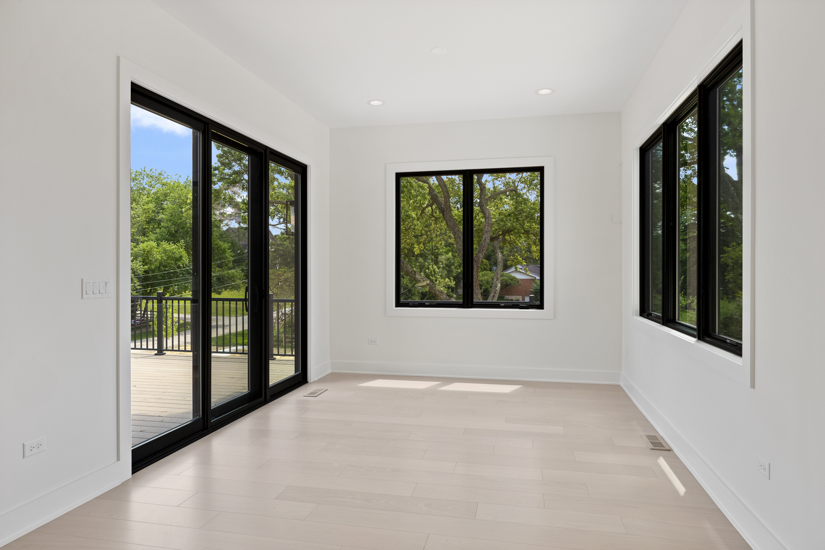 11901 Heritage Drive Burr Ridge, IL 60527 - Photo 11 of 47 a view of an empty room with large windows