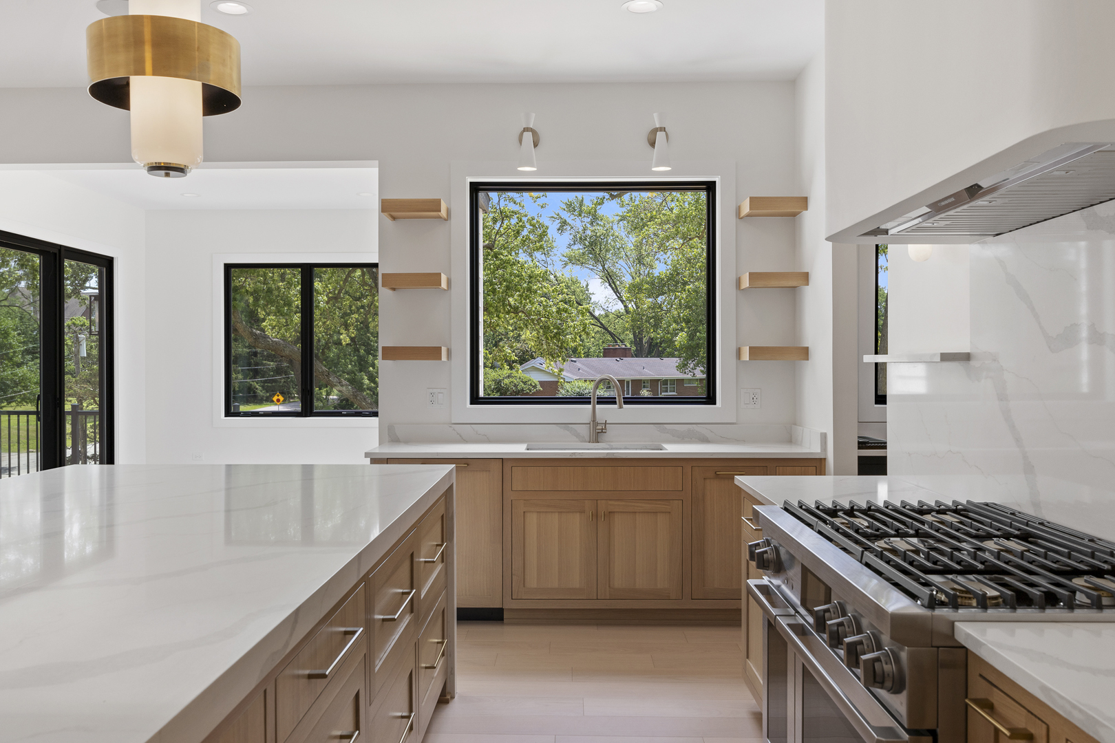 11901 Heritage Drive Burr Ridge, IL 60527 - Photo 12 of 47 a kitchen with a sink and a large window