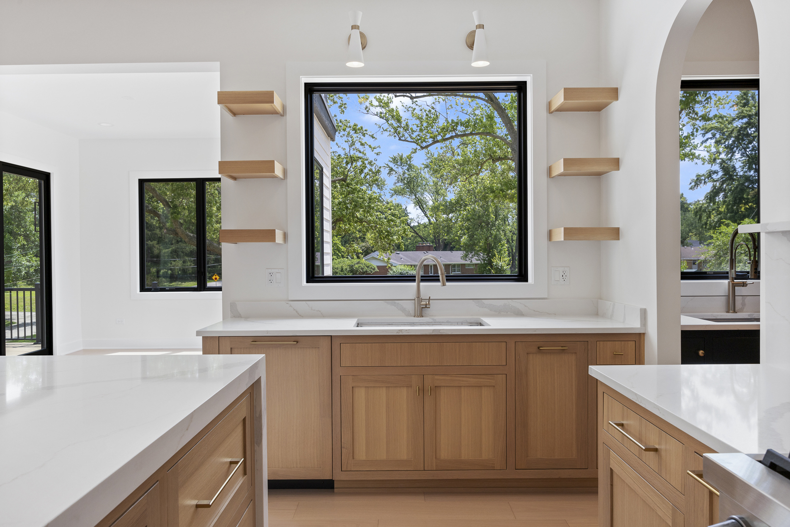 11901 Heritage Drive Burr Ridge, IL 60527 - Photo 13 of 47 a kitchen with a sink and large window