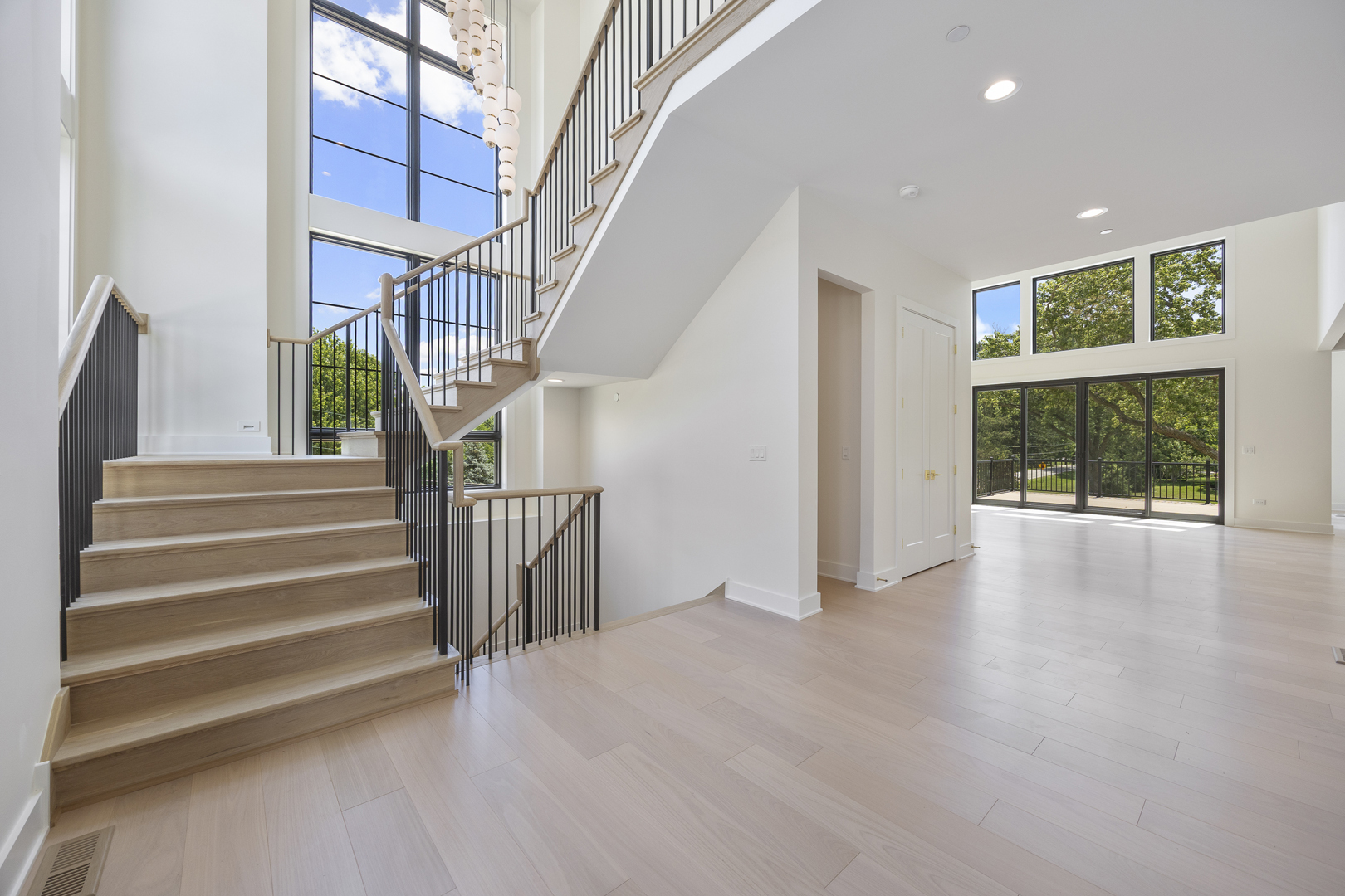 11901 Heritage Drive Burr Ridge, IL 60527 - Photo 15 of 47 a view of entryway and hall with wooden floor
