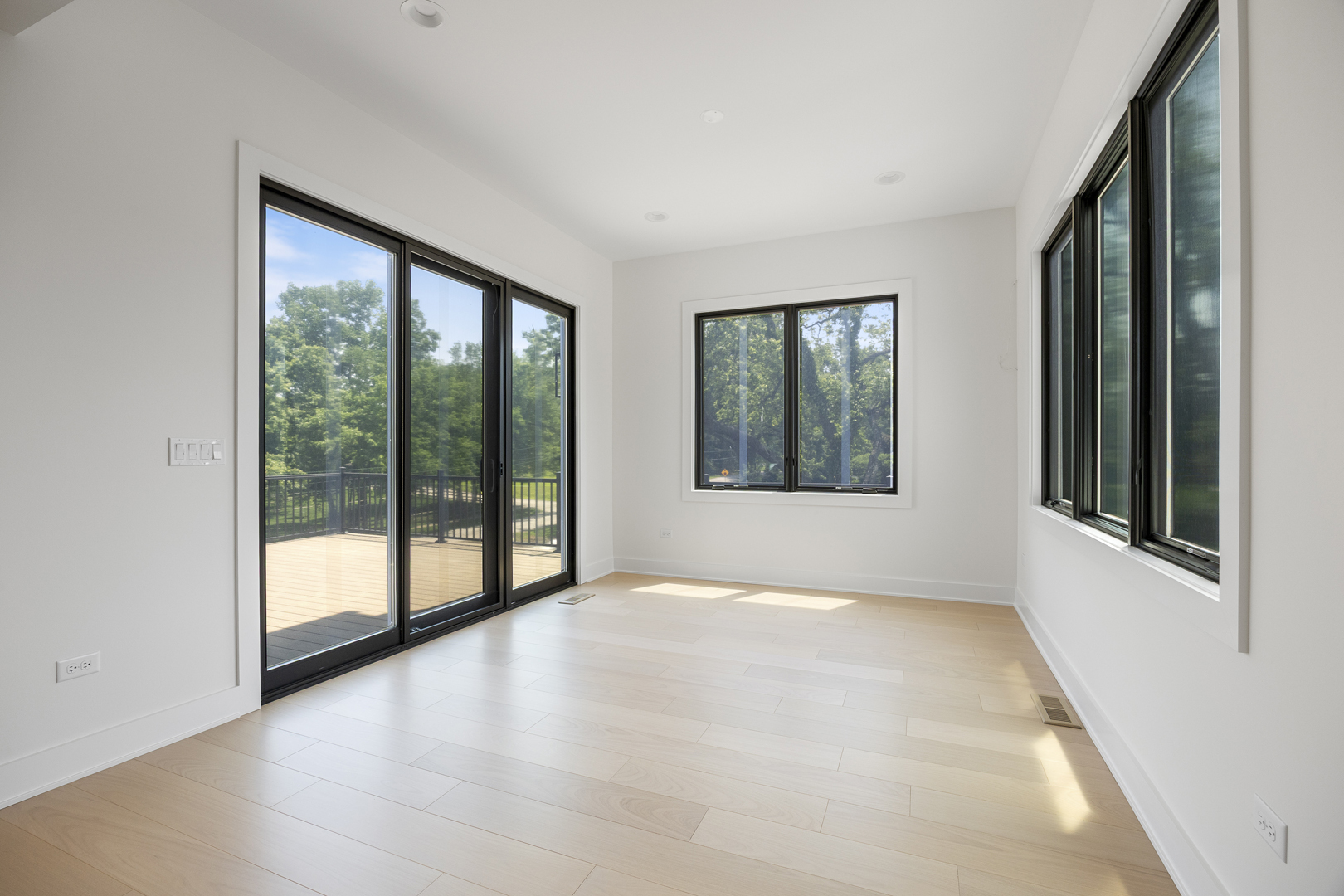 11901 Heritage Drive Burr Ridge, IL 60527 - Photo 22 of 47 a view of an empty room with wooden floor and a window