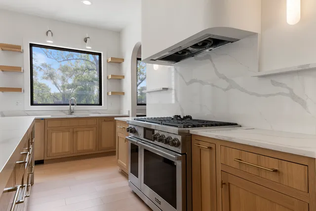 a view of cabinets with wooden floor