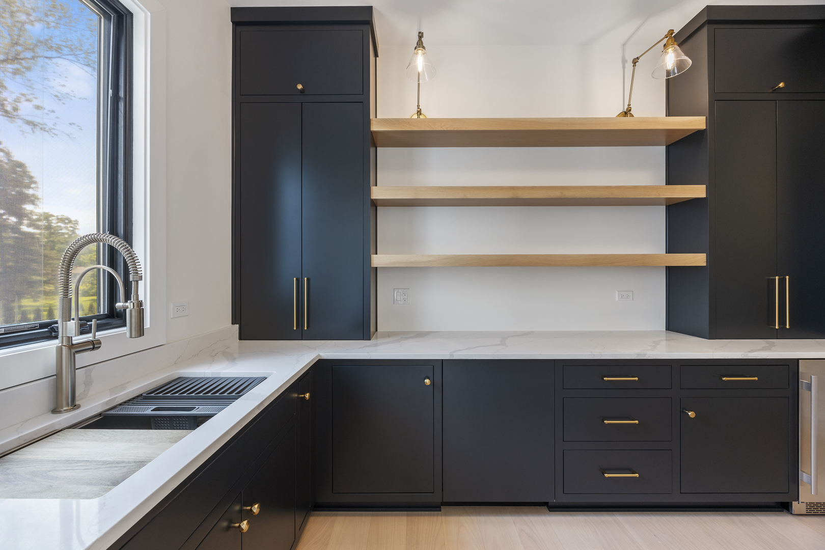 11901 Heritage Drive Burr Ridge, IL 60527 - Photo 30 of 47 a kitchen with a sink and cabinets