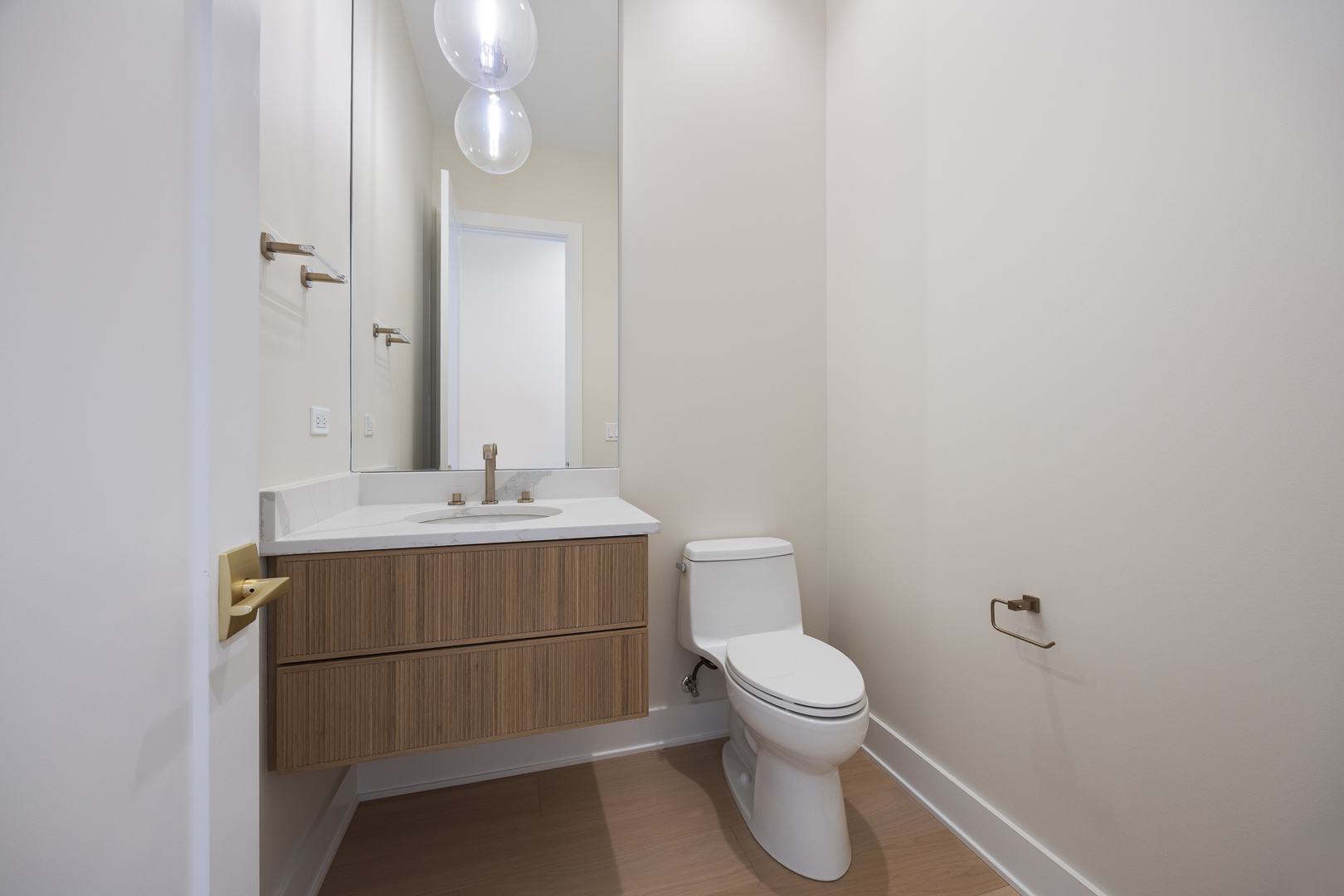 11901 Heritage Drive Burr Ridge, IL 60527 - Photo 31 of 47 a bathroom with a sink a toilet and a mirror