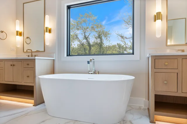 a bathroom with a shower and toilet