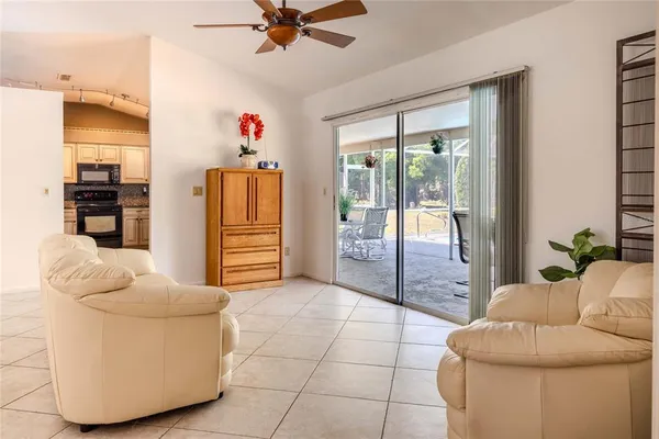 a living room with furniture and a window
