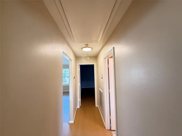 a view of lake with a house in the background
