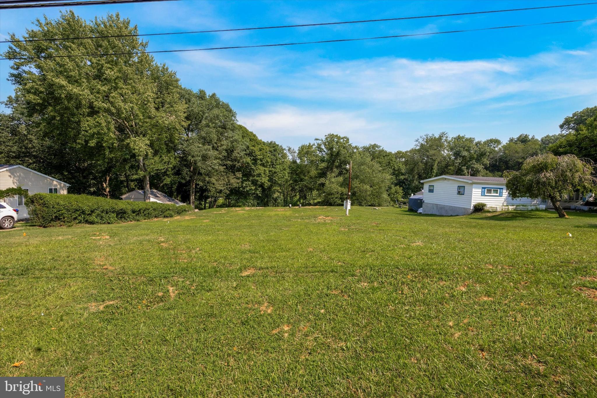300 Oaklyn Road Coatesville, PA 19320 - Photo 5 of 8 a view of a green field with clear sky