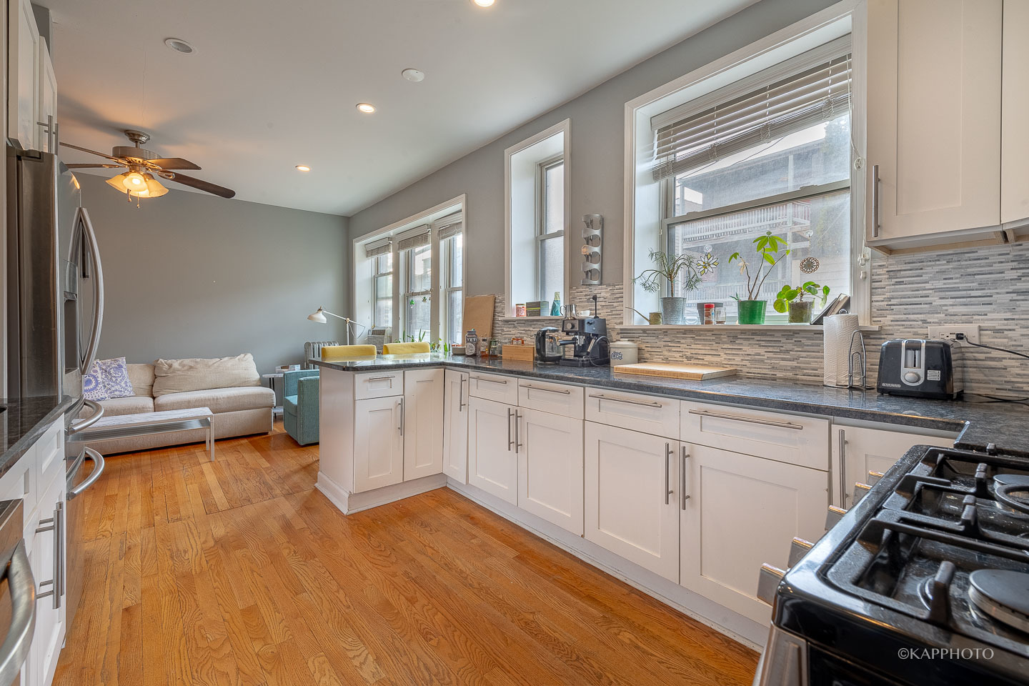 1323 West Addison Street, Unit 1B Chicago, IL 60613 - Photo 16 of 25 a kitchen with a sink appliances and cabinets