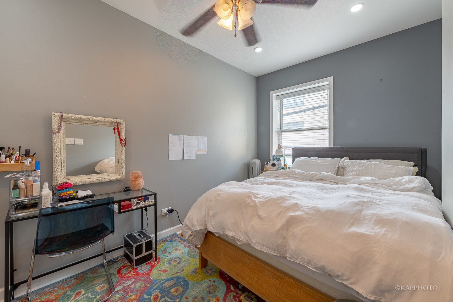 1323 West Addison Street, Unit 1B Chicago, IL 60613 - Photo 18 of 25 a bedroom with a bed and a window