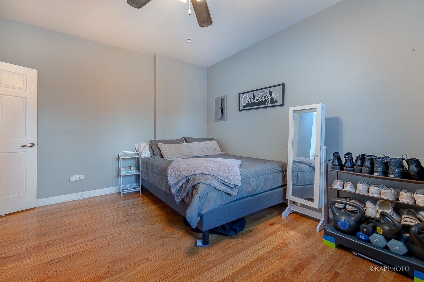 1323 West Addison Street, Unit 1B Chicago, IL 60613 - Photo 22 of 25 a bedroom with a bed and a walk in closet