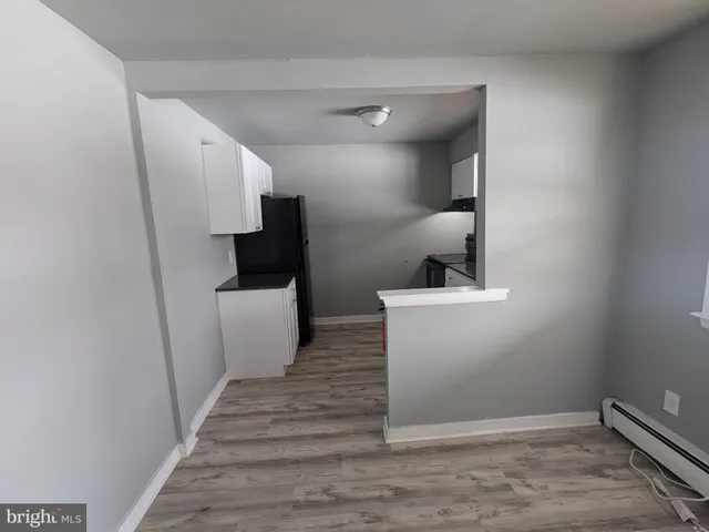 a view of a hallway view with staircase