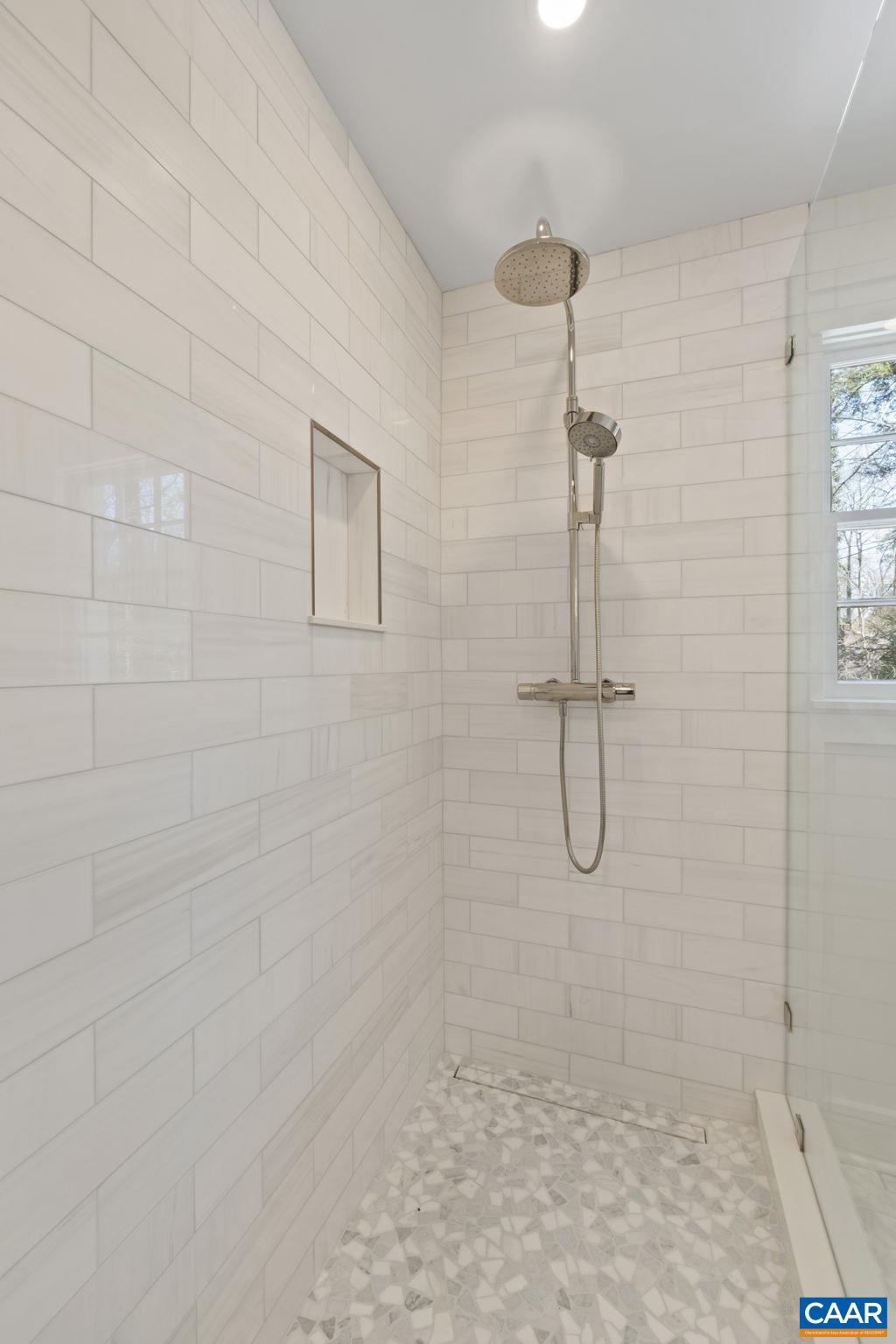 1404 Meadowbrook Road Charlottesville, VA 22903 - Photo 30 of 74 a bathroom with a glass shower