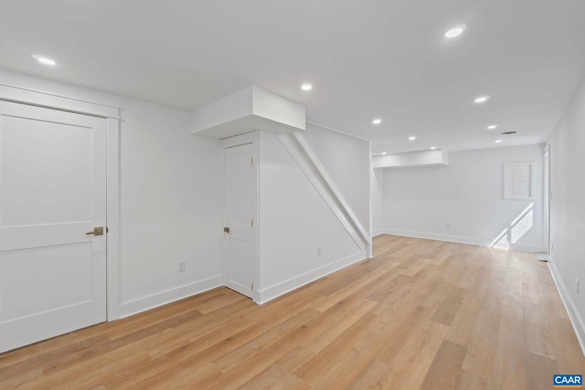 1404 Meadowbrook Road Charlottesville, VA 22903 - Photo 36 of 74 a view of empty room with wooden floor