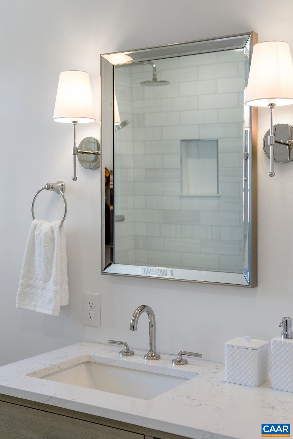 1404 Meadowbrook Road Charlottesville, VA 22903 - Photo 54 of 74 a bathroom with a sink and mirror