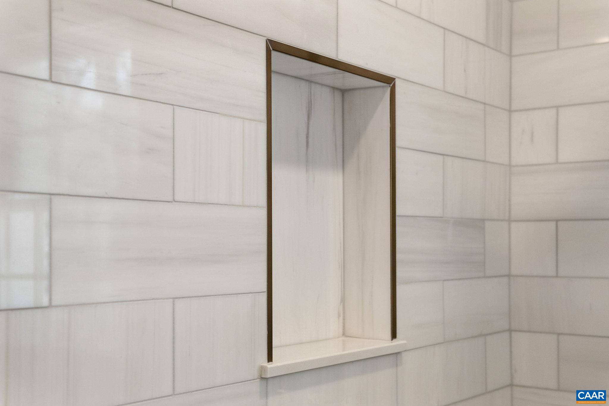 1404 Meadowbrook Road Charlottesville, VA 22903 - Photo 57 of 74 a bathroom with a glass shower door