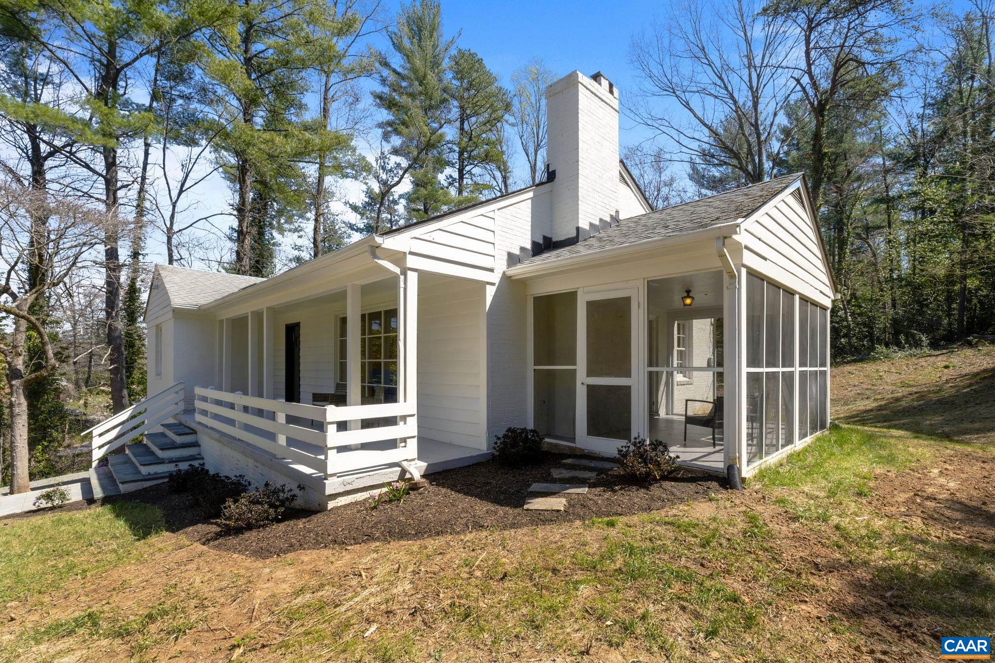 1404 Meadowbrook Road Charlottesville, VA 22903 - Photo 66 of 74 a view of a house with a yard and large tree