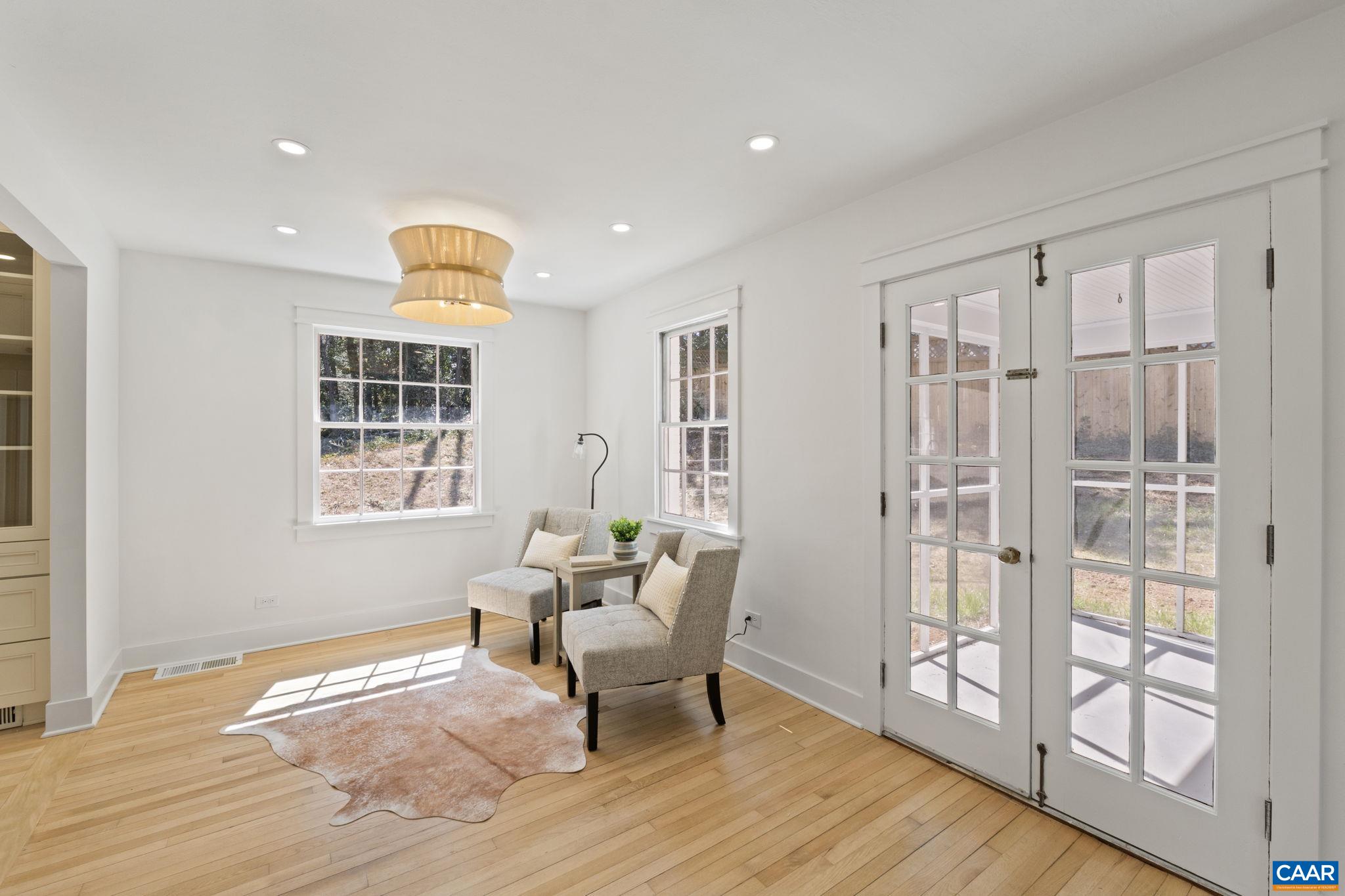 1404 Meadowbrook Road Charlottesville, VA 22903 - Photo 10 of 74 a living room with furniture and a window