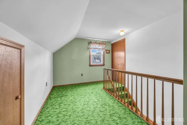 a view of hallway with stairs