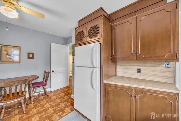a kitchen with stainless steel appliances a refrigerator and a sink
