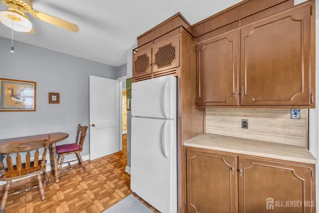 a kitchen with stainless steel appliances a refrigerator and a sink