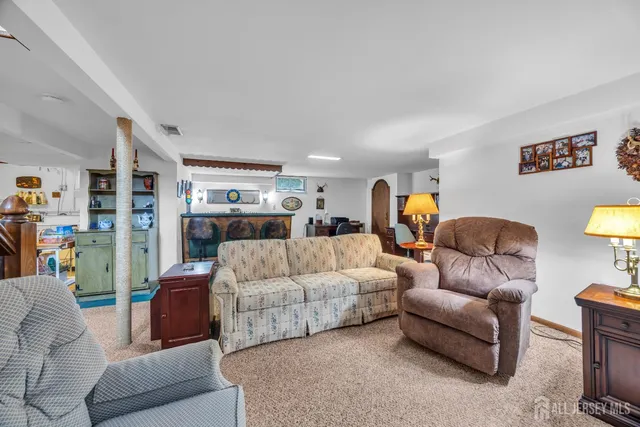 a living room with furniture and a couch
