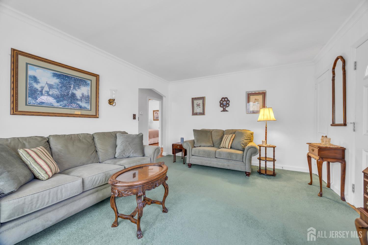 143 Safran Avenue Edison, NJ 08837 - Photo 6 of 35 a living room with furniture and a couch