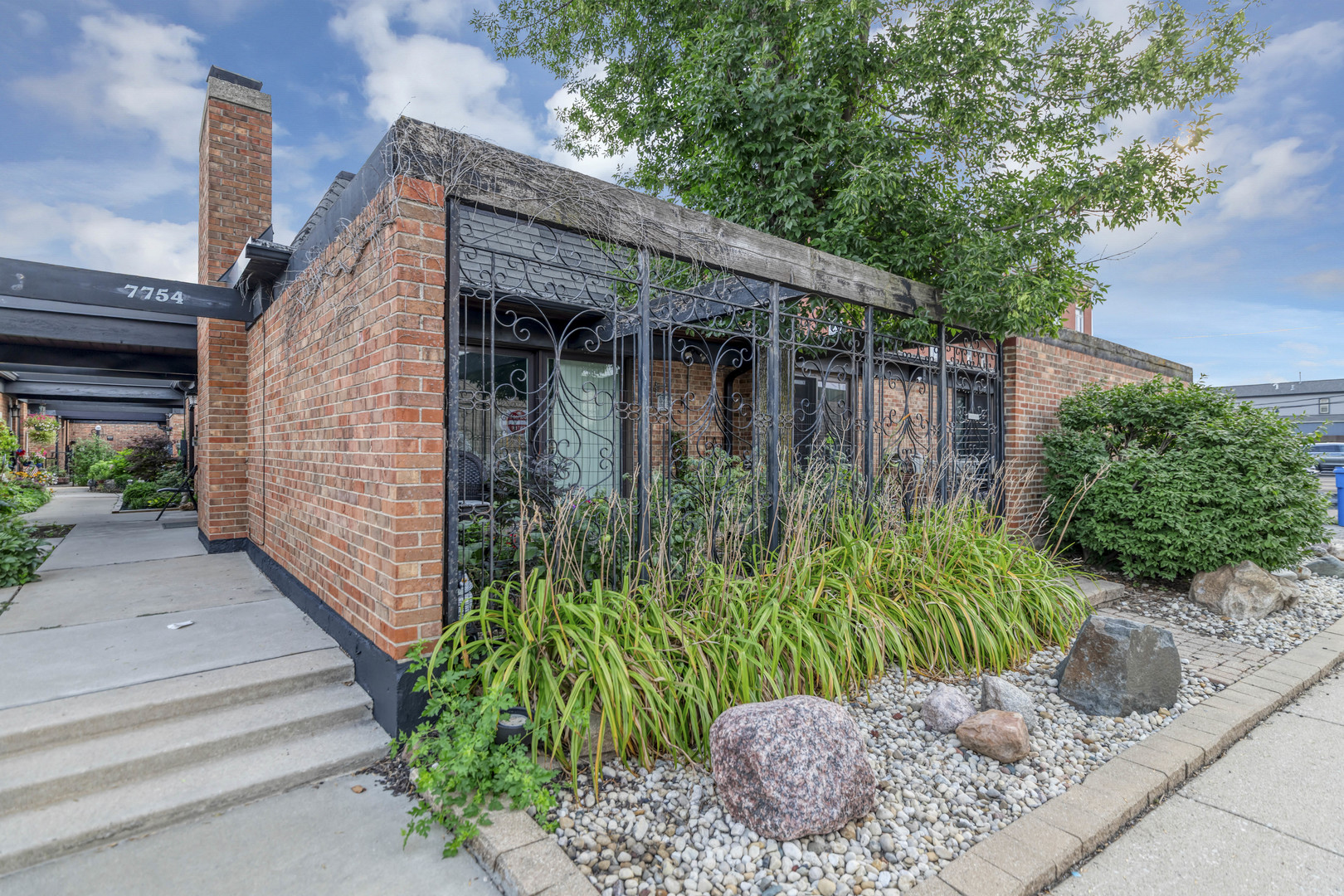 a backyard of a house with lots of green space