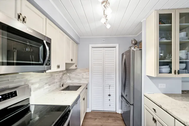 $299,900 | 7754 West Higgins Road, Unit J, Chicago, IL 60631