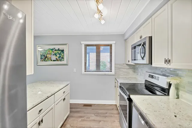 $299,900 | 7754 West Higgins Road, Unit J, Chicago, IL 60631