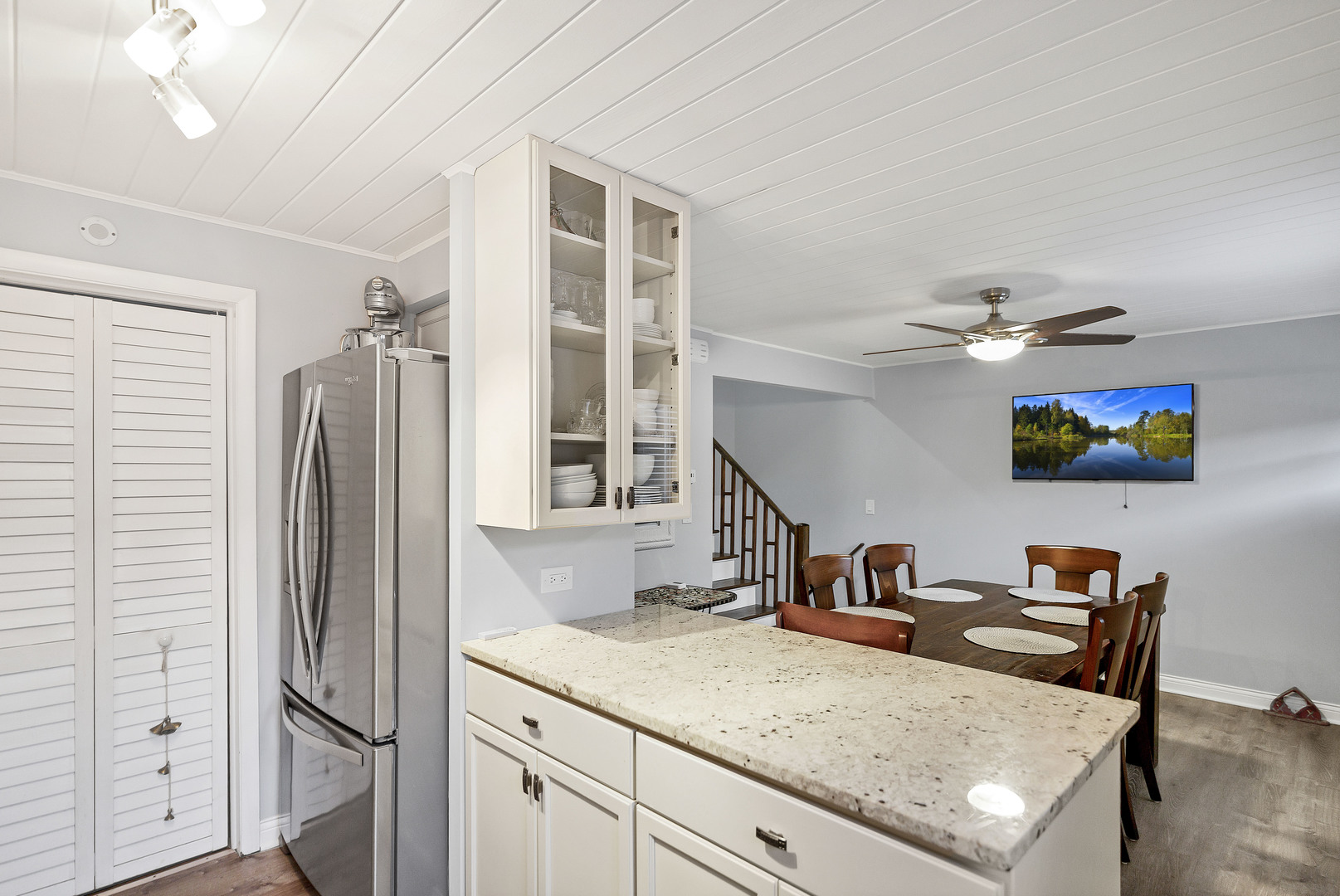 7754 West Higgins Road, Unit J Chicago, IL 60631 - Photo 14 of 23 a living room with furniture and a flat screen tv