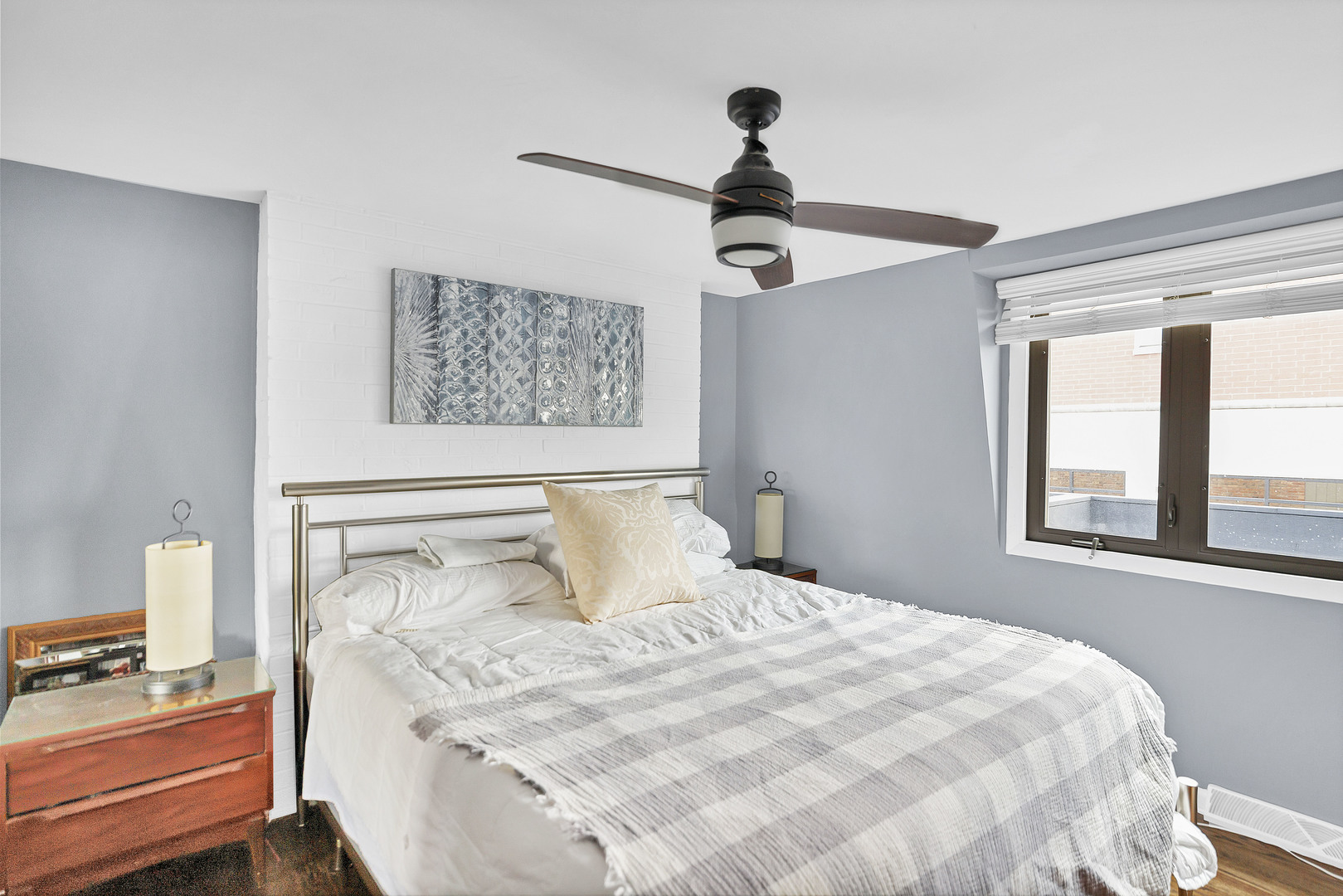 7754 West Higgins Road, Unit J Chicago, IL 60631 - Photo 16 of 23 a bedroom with a bed and a window