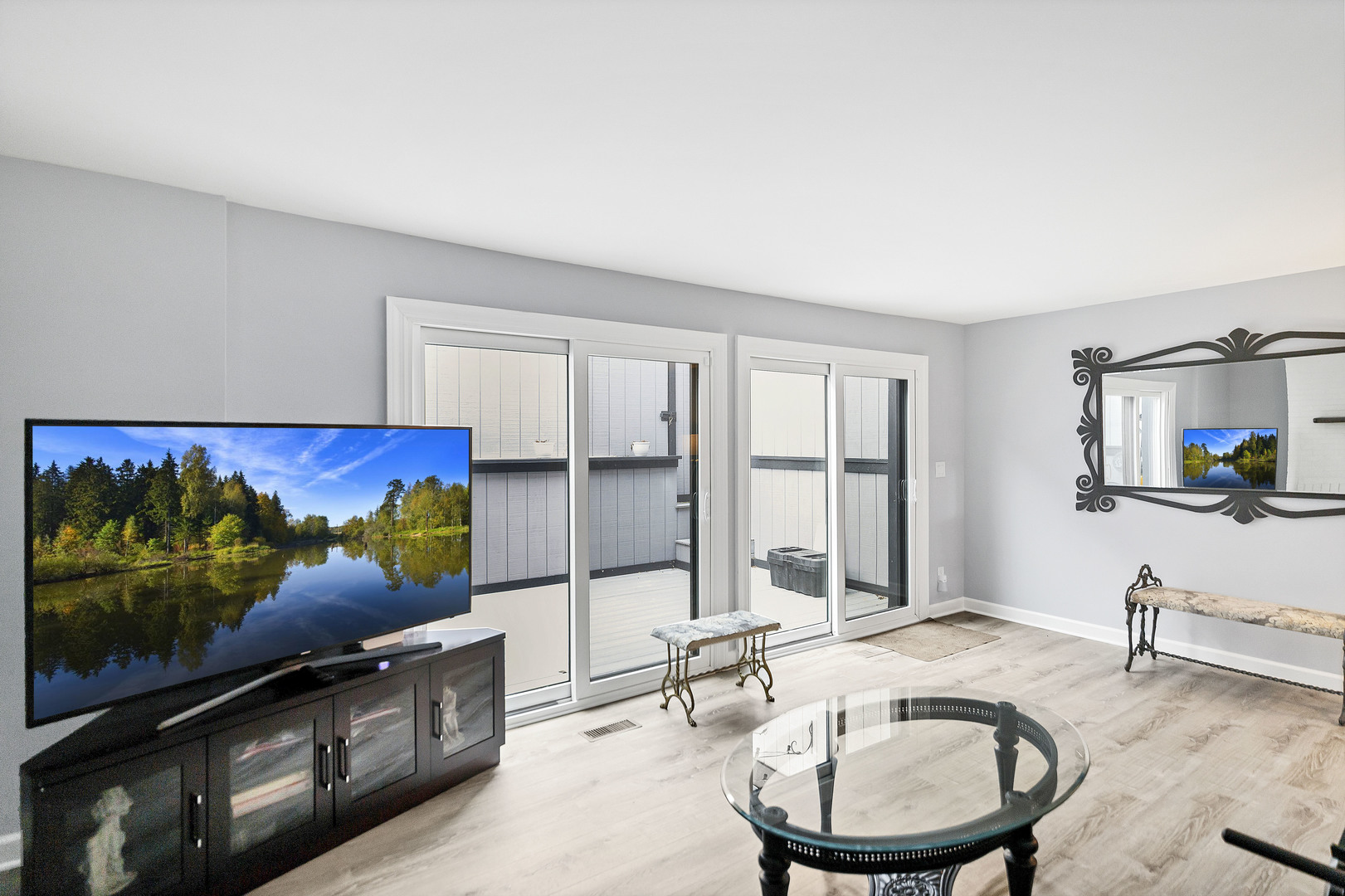 7754 West Higgins Road, Unit J Chicago, IL 60631 - Photo 5 of 23 a living room with furniture and a flat screen tv