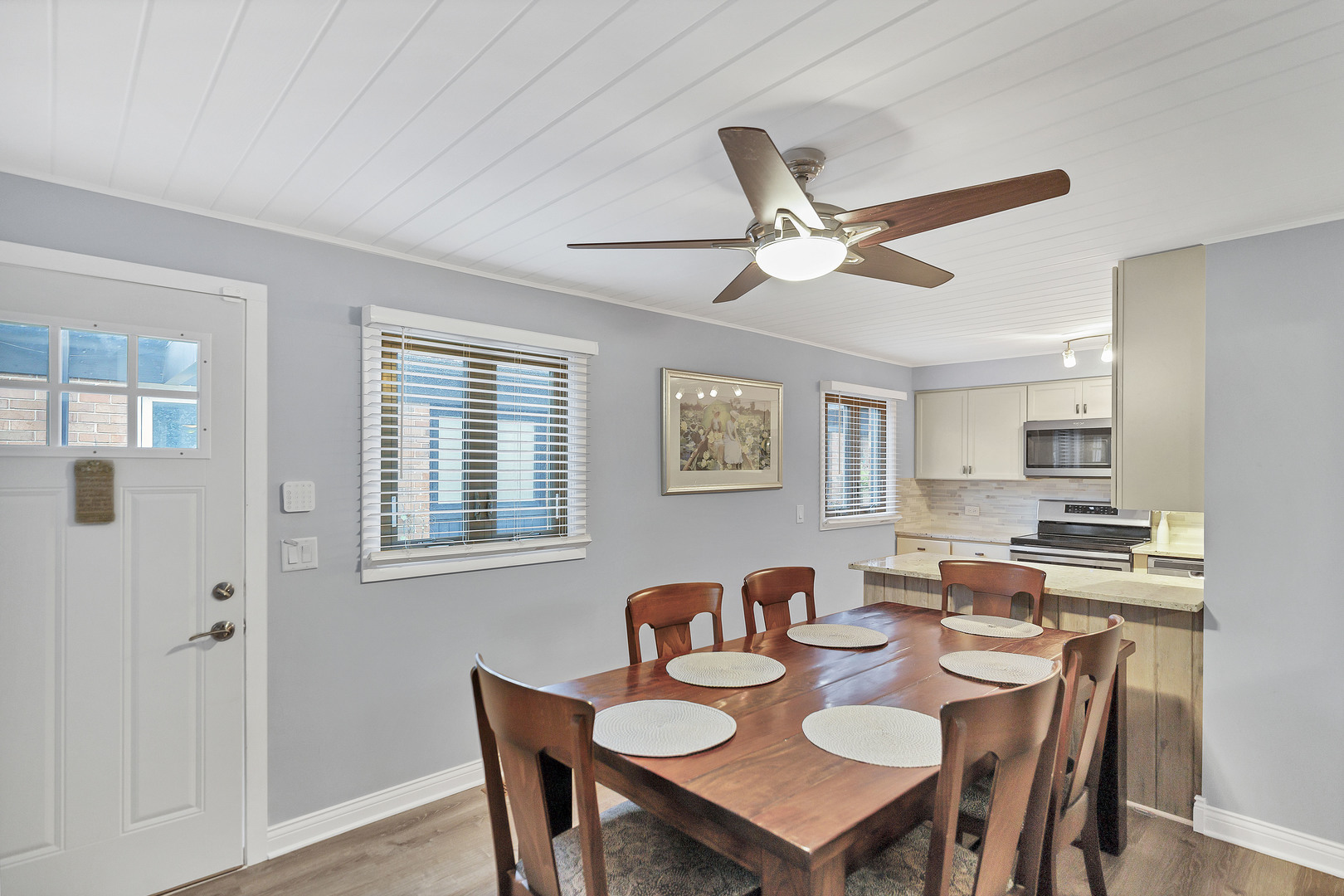7754 West Higgins Road, Unit J Chicago, IL 60631 - Photo 8 of 23 a dining room with furniture and window