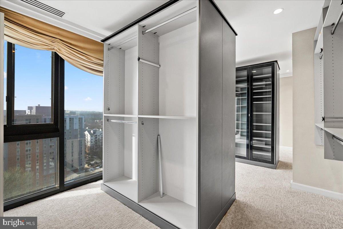 1530 Key Boulevard, Unit 1310 Arlington, VA 22209 - Photo 20 of 37 Sleek closet design with city views.
