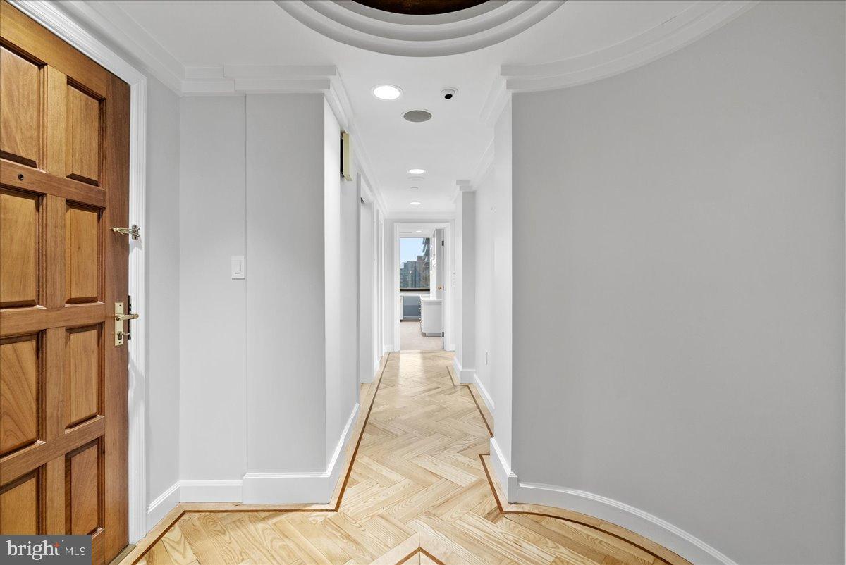 1530 Key Boulevard, Unit 1310 Arlington, VA 22209 - Photo 27 of 37 Elegant hallway with stunning views ahead.