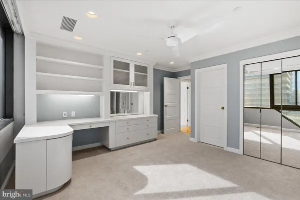 a room with a furniture and a window
