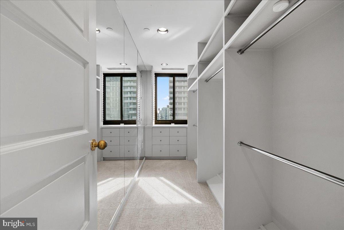 1530 Key Boulevard, Unit 1310 Arlington, VA 22209 - Photo 32 of 37 Bright and spacious walk-in closet retreat.