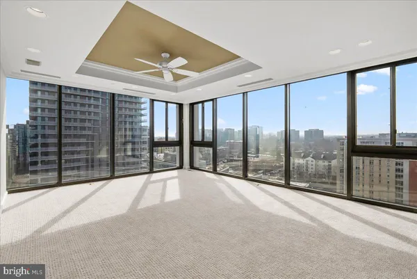 a view of an empty room with a balcony