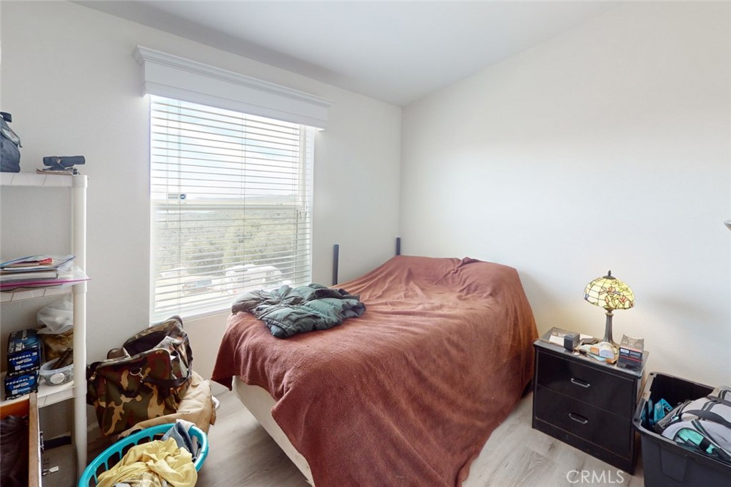 280 Canyon Creek Road Berry Creek, CA 95916 - Photo 13 of 36 a bed sitting in a bedroom next to a window