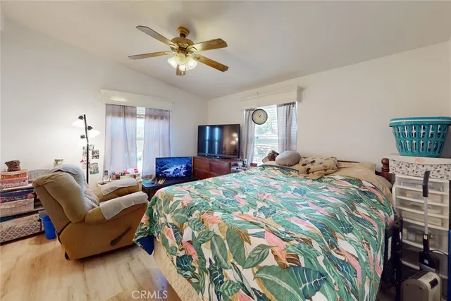 a bedroom with a bed and furniture