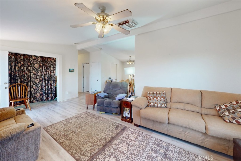 280 Canyon Creek Road Berry Creek, CA 95916 - Photo 6 of 36 a living room with furniture rug and wooden floor