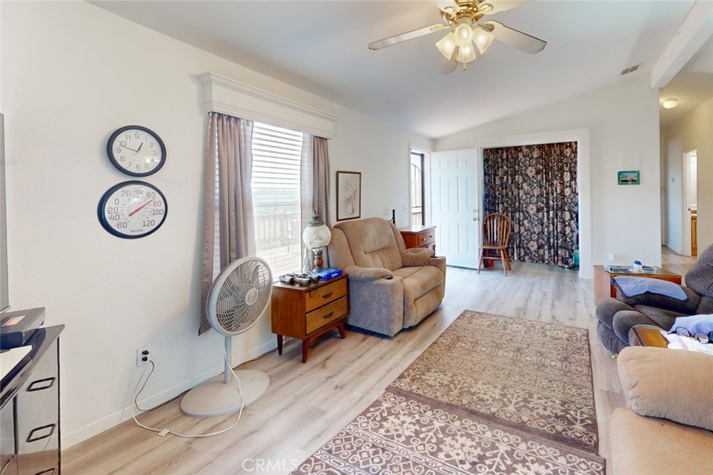 280 Canyon Creek Road Berry Creek, CA 95916 - Photo 8 of 36 a living room with furniture and a large window